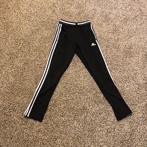 Black and white adidas pants